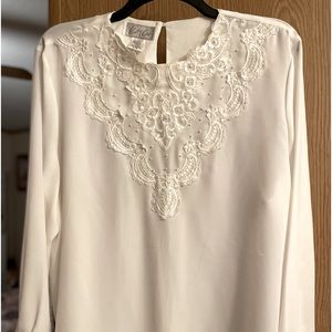 Cream sheer top polyester material
